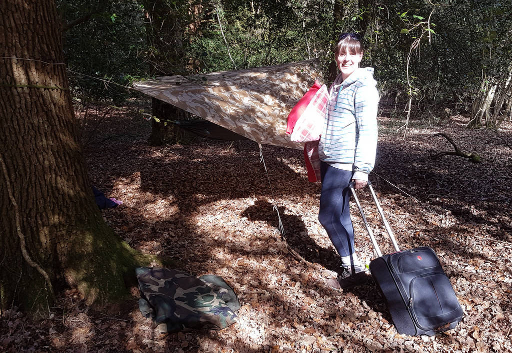 A person walking into the woods